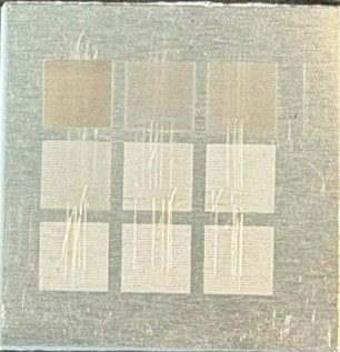 Aluminum coupon with nine lightly textured squares